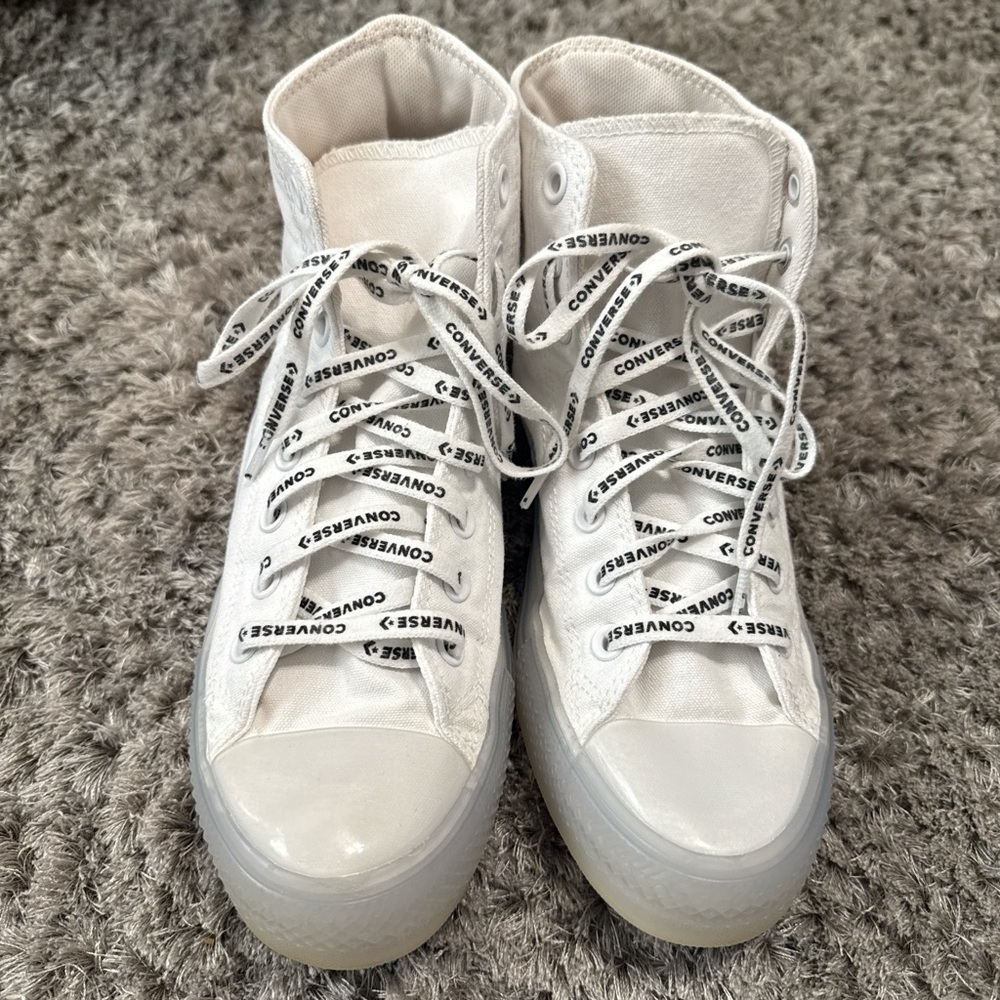 White Converse High Tops with Clear Sole
Size 8/10